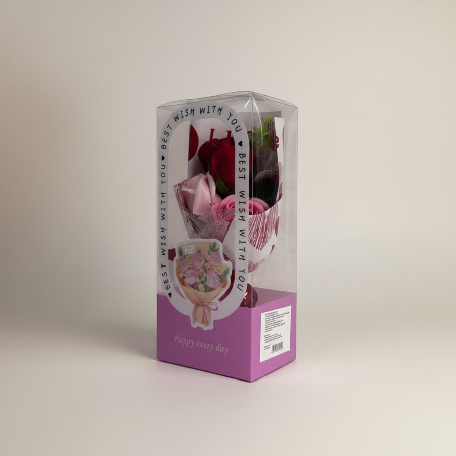 eRamis bouquet of artificial red and pink roses in a clear box with "Best Wish With You" text.