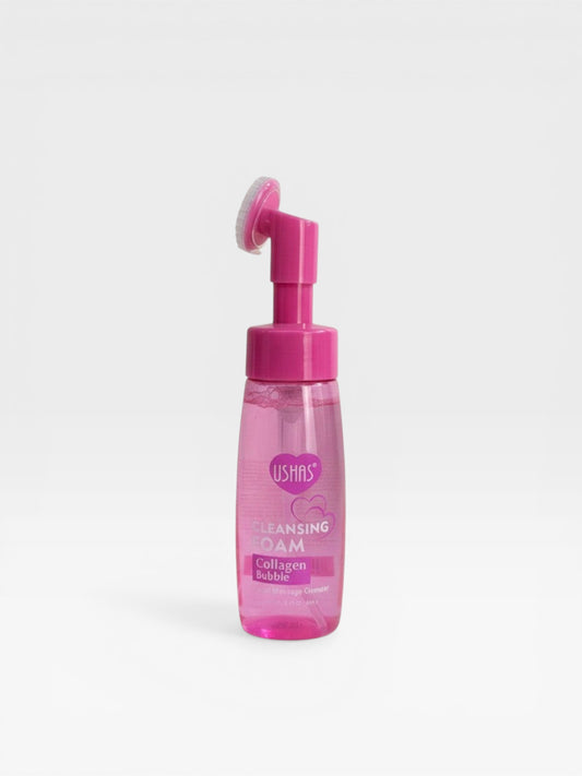 eRamis Ushas pink bottle of collagen bubble massage cleanser with built-in brush applicator for facial cleansing.