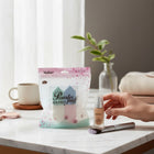 eRamis 4-piece set of triangular makeup sponges in pastel blue, mint green, white, and pink. Soft and comfortable for wet or dry use.