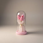 eRamis pink preserved tulips under glass dome with fairy lights and pink base.