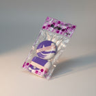 eRamis purple and white swirl makeup sponges with pink ribbon, packaged.