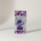 eRamis purple and white makeup sponges, one round and one rectangular, with pink ribbon accents.
