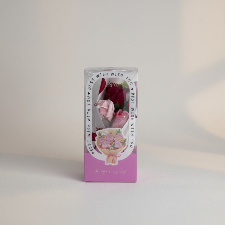 eRamis bouquet of red and pink soap roses in a clear box with 'Happy every day' text.