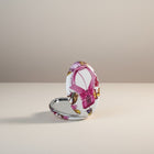 eRamis round compact mirror with floral and butterfly print, featuring a pink ribbon detail.