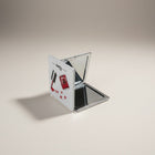eRamis square makeup mirror with a red nail polish bottle design and silver trim. Compact and portable.