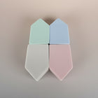eRamis set of 4 triangular makeup sponges in pastel green, blue, grey, and pink.