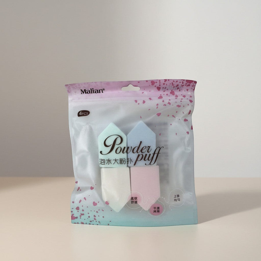 eRamis set of 4 pastel triangular makeup sponges for precise foundation and contour application.