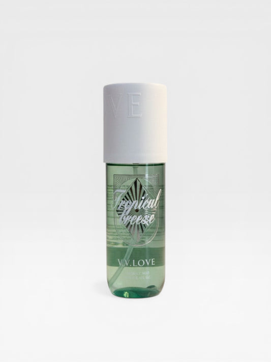 eRamis Tropical Breeze Fragrance Mist, a clear bottle with green liquid and a white cap embossed with 'VE'.