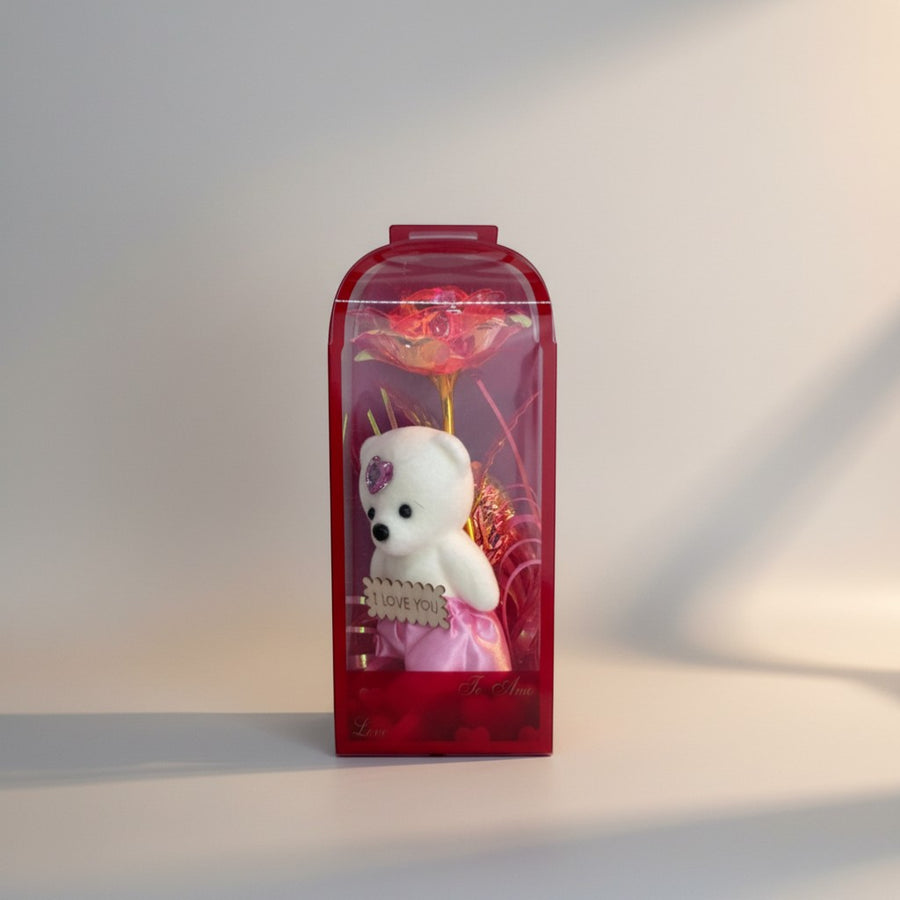 eRamis white teddy bear with pink skirt and "I Love You" sign, inside a red gift box with a rose.