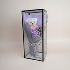 eRamis white teddy bear with pink heart saying "I Love You", purple rose bouquet, and decorative pearls in a clear box.