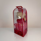 eRamisHere teddy bear with red heart and "Love" text, in clear gift box with red ribbon accents.