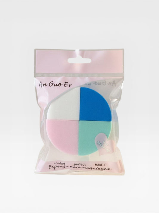 eRamisHere set of 4 triangular makeup sponges in blue, white, pink, and green for foundation and concealer application.