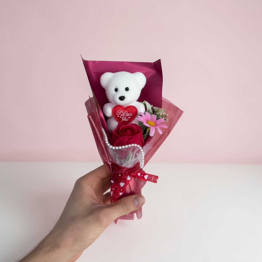 eRamisHere white teddy bear with red I Love You heart, red rose, and pink flower bouquet.
