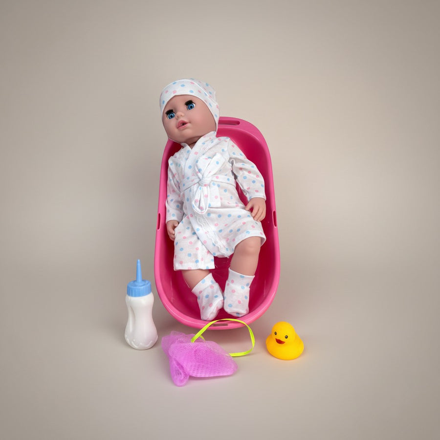 eRamis baby doll in pink polka dot robe and hat, with bathtub, bottle, washcloth, and rubber ducky.