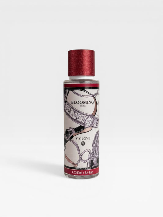 eRamis Blooming Rose fragrance mist with a shimmering red cap and belt-inspired graphics. 250ml/8.4 fl.oz.
