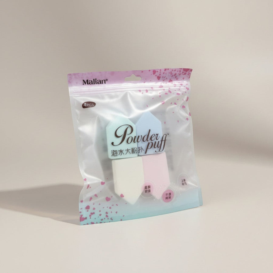 eRami 4-piece set of triangular powder puffs in pastel blue, mint green, pink, and white. Soft and comfortable for wet or dry use.